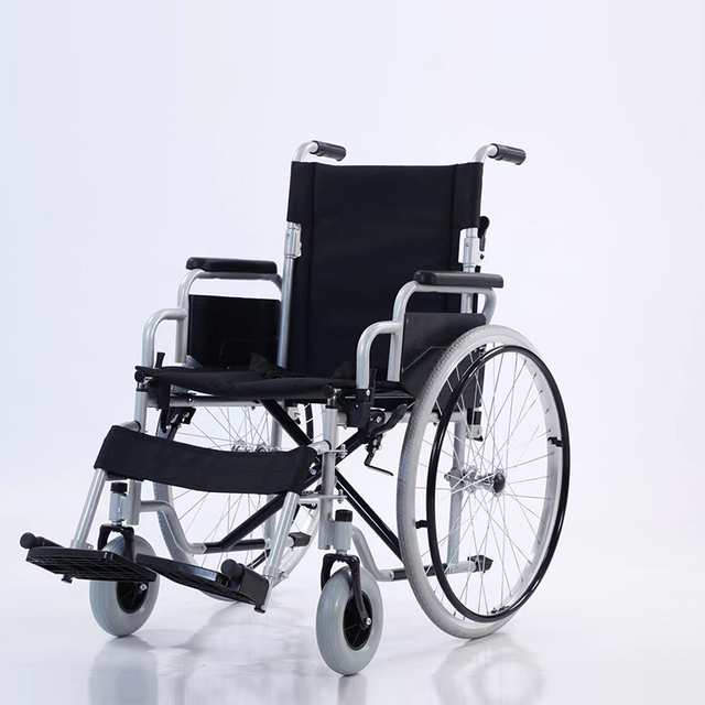 Silla de ruedas manual plegable de alta calidad con reposabrazos abatibles de PU y tapicer&iacute;a Oxford ign&iacute;fuga